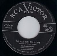 THE MAN WITH THE BANJO / MAN MAN IS FOR THE WOMAN MADE